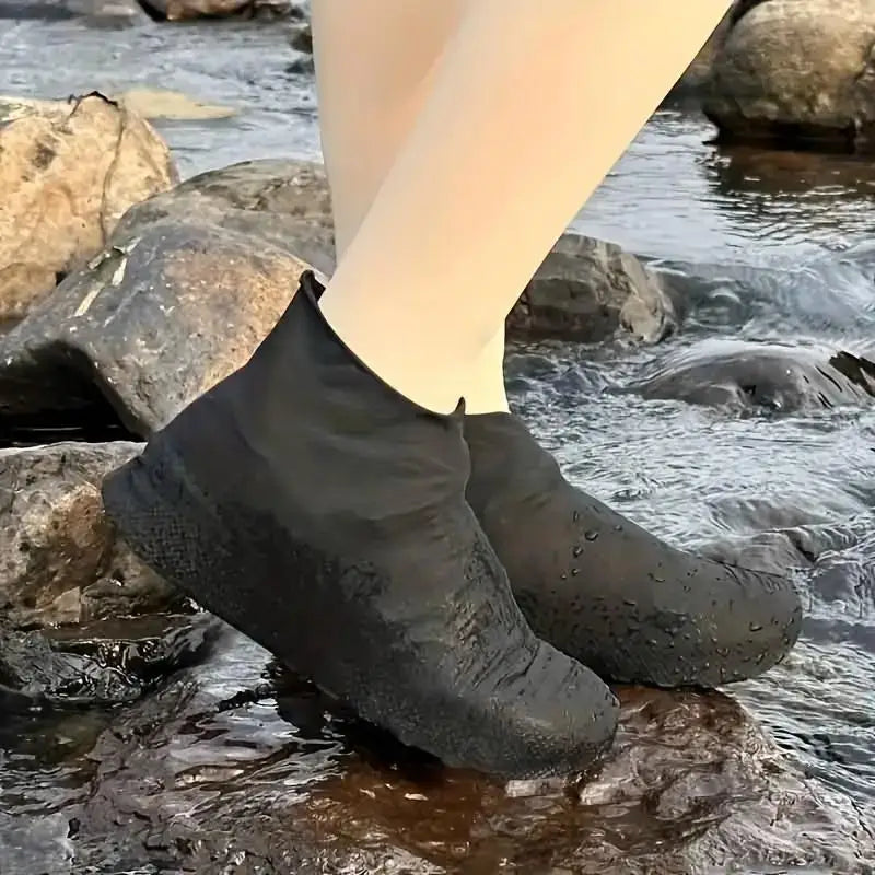 1 pair of black latex waterproof shoe covers, anti slip and wear-resistant, suitable for mountaineering and hiking